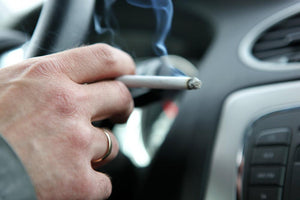 someone smoking in car